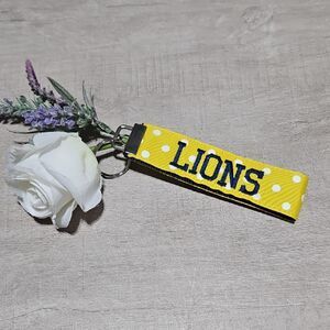 Lions 🎁 Yellow, White Polka Dot, and Navy Blue Strap Key Holder Bag Charm
